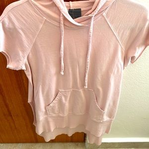 Blush pink short sleeved hoodie. Size XS but runs big